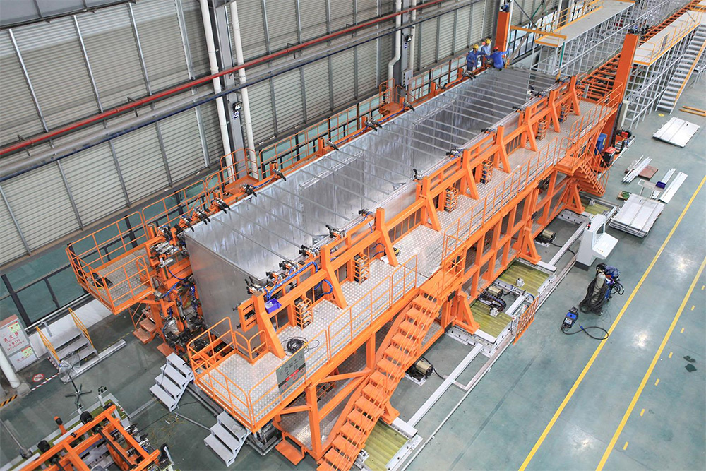 1616725325729538.jpg 1000铝合金车厢生产线案例现场2.jpg